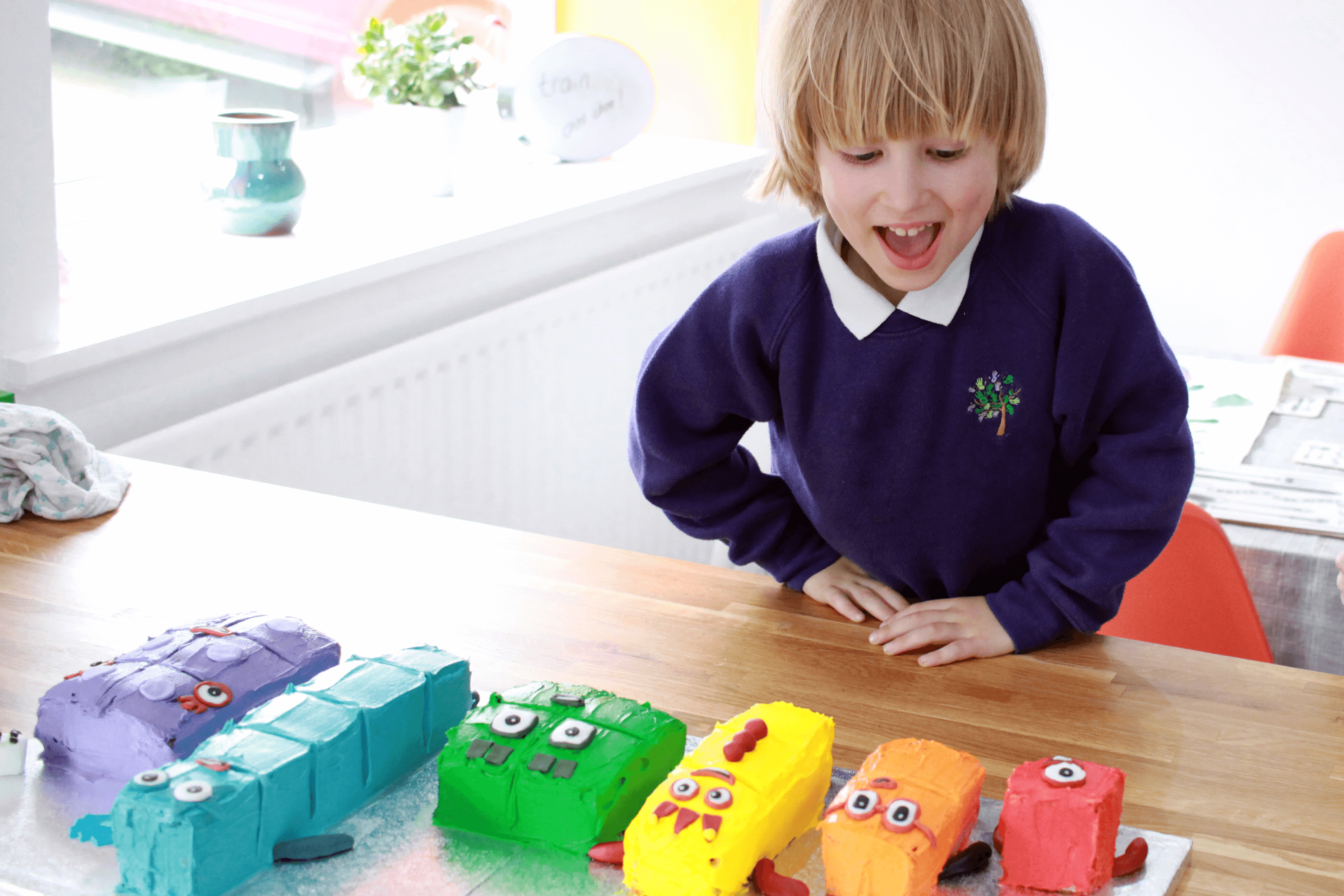 Toby seeing his Numberblocks birthday cake for the first time