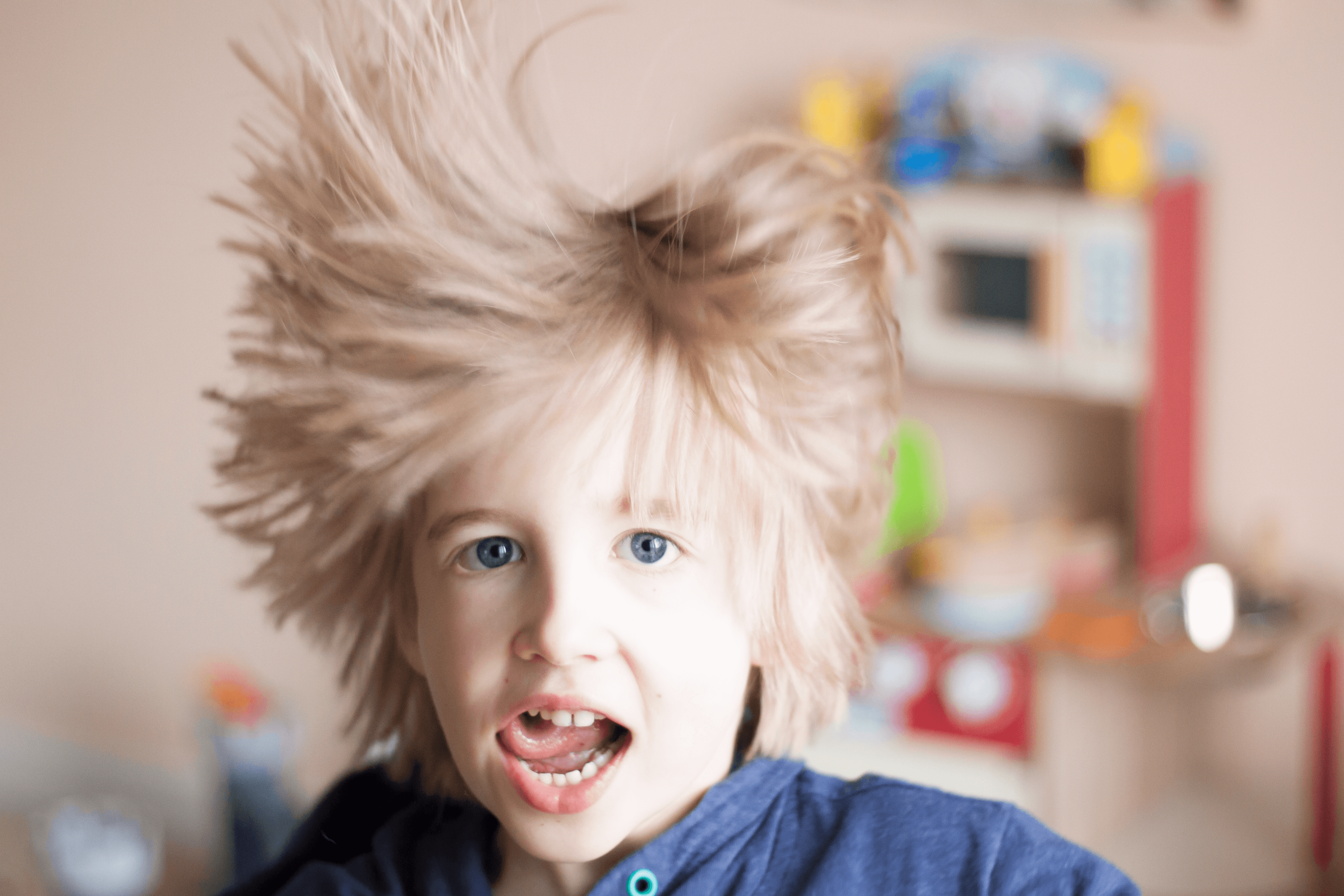 Toby jumping and showing off his crazy hair