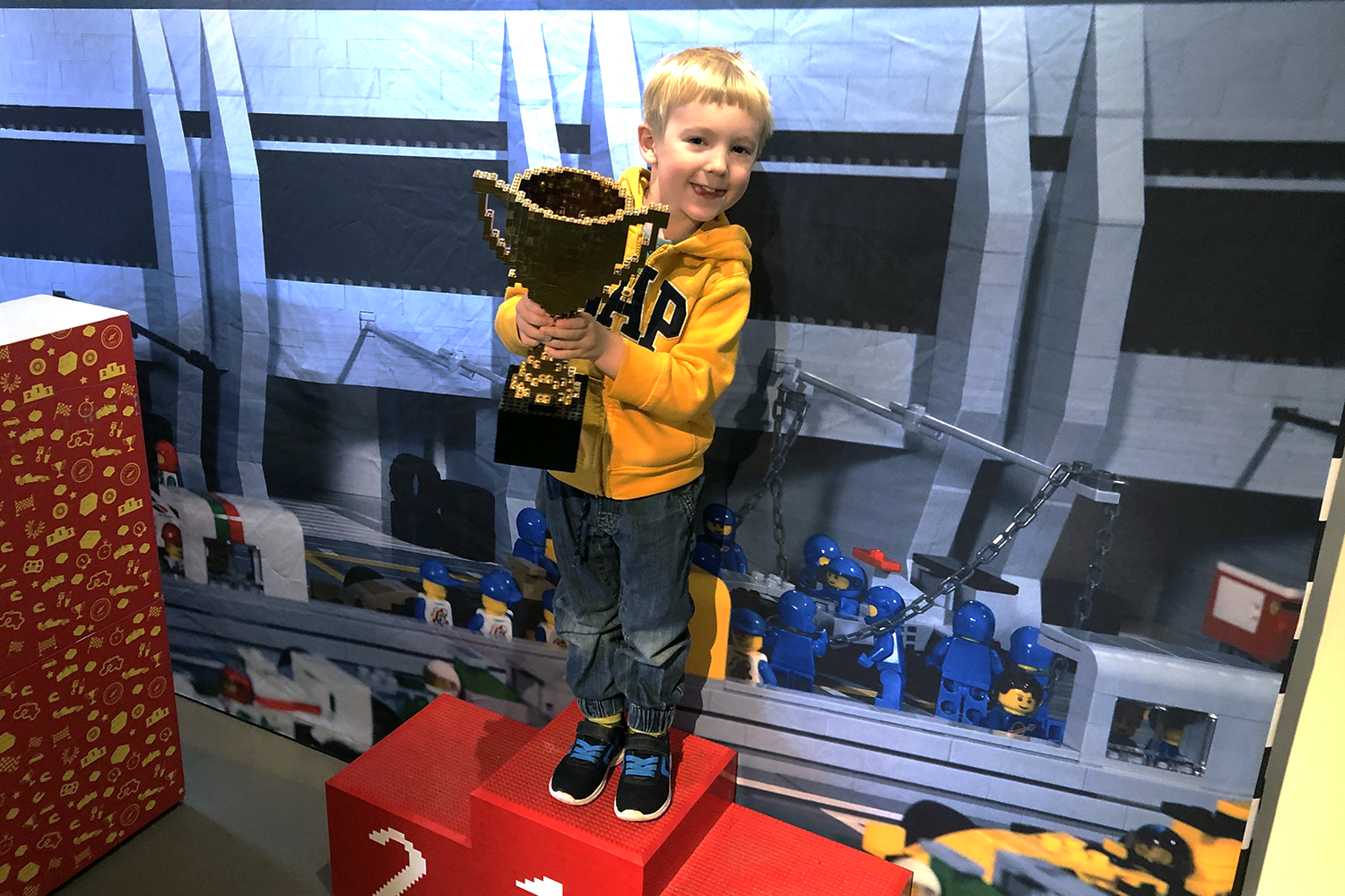 Gabe holding a Lego cup at the Brick Science event at Rheged