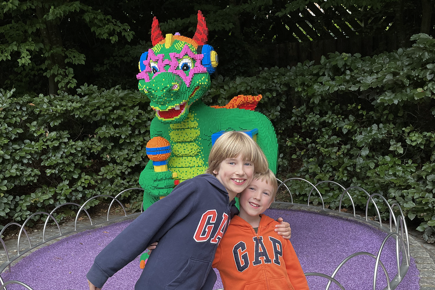 Toby and Gabe in front of a Lego dragon at Legoland Windsor
