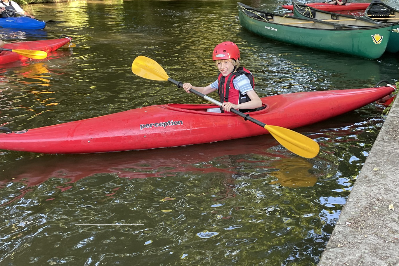 Toby in a kayak on the canal